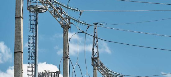 high-voltage-electrical-transformers-electricity-distribution-power-plant-high-voltage-power-lines-life-power-supply-close-up