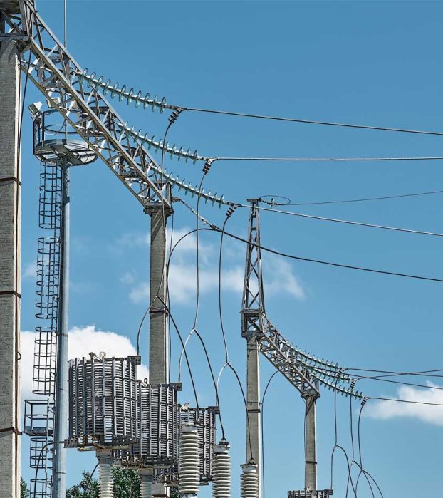 high-voltage-electrical-transformers-electricity-distribution-power-plant-high-voltage-power-lines-life-power-supply-close-up